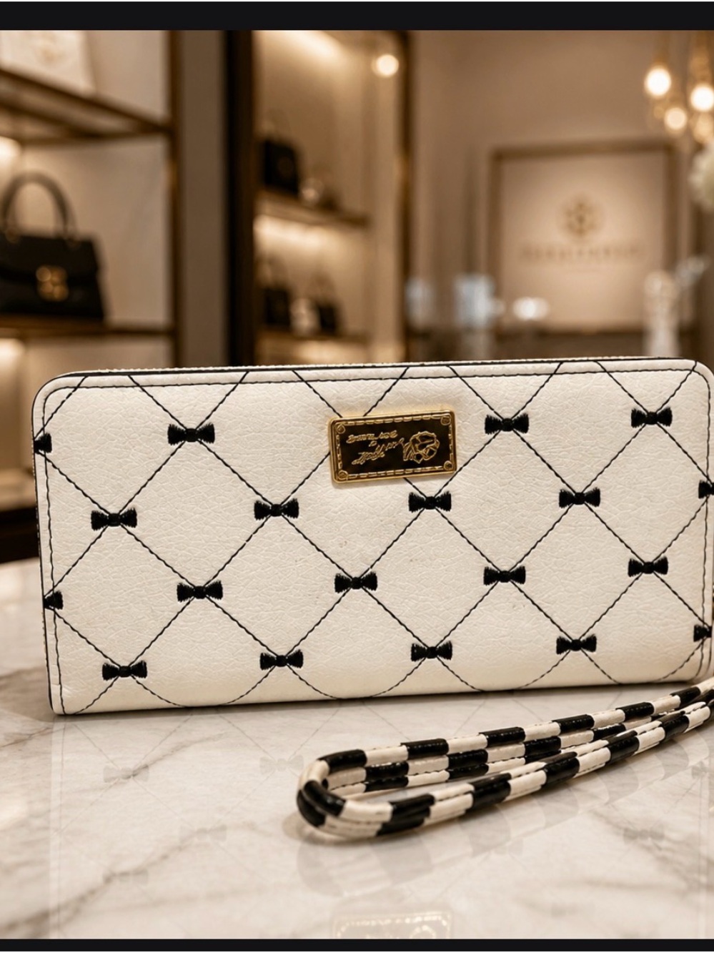 Betsey Johnson White Quilted Wristlet Wallet with Black Bow Detail
